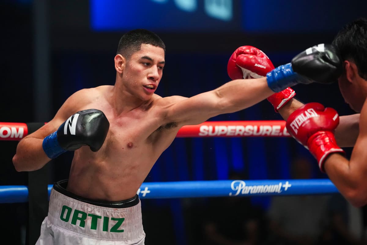 Ivan Ortiz throws a jab during his bout against Justin Viloria