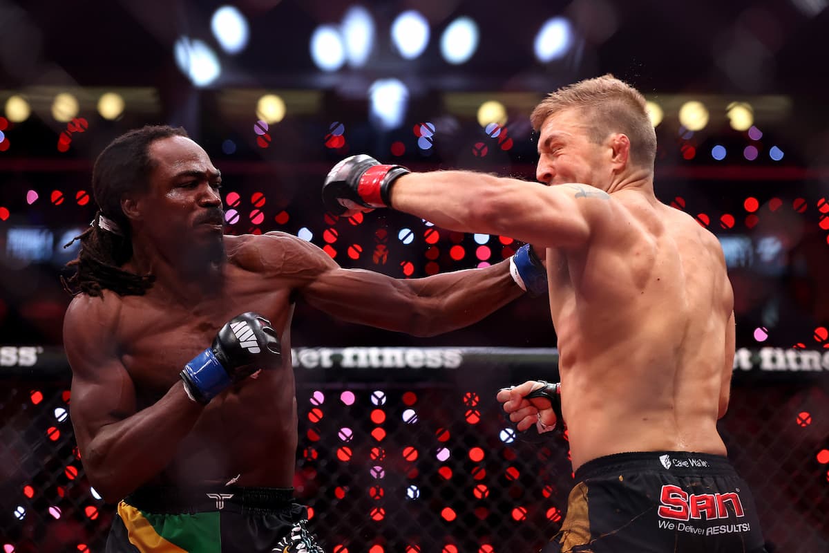 Jason Jackson lands a left hook during his bout against Jefferson Creighton