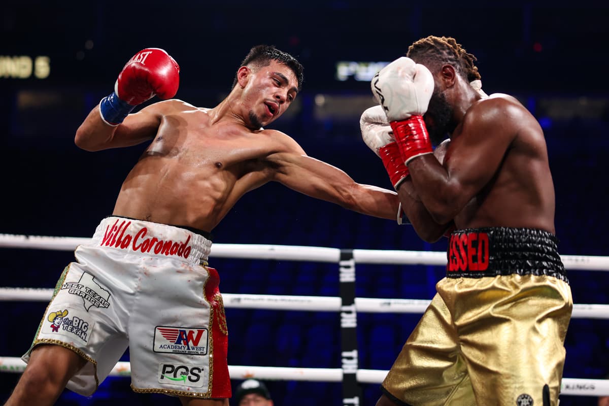 Javier Meza landing a body shot during his fight against Damonte Smith