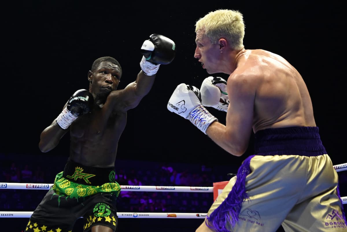Joel Kodua throws a jab during his bout against Will Harrison