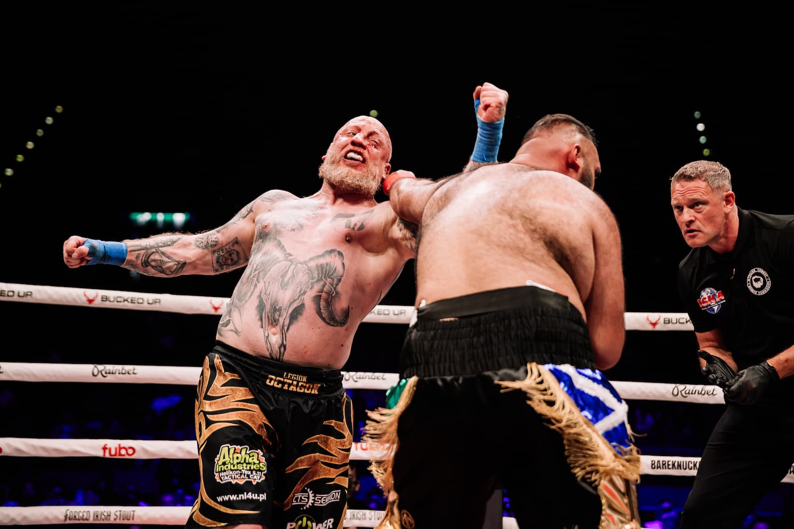 Lukasz Parobiec throws an uppercut during his bout against Kaseem Saleem