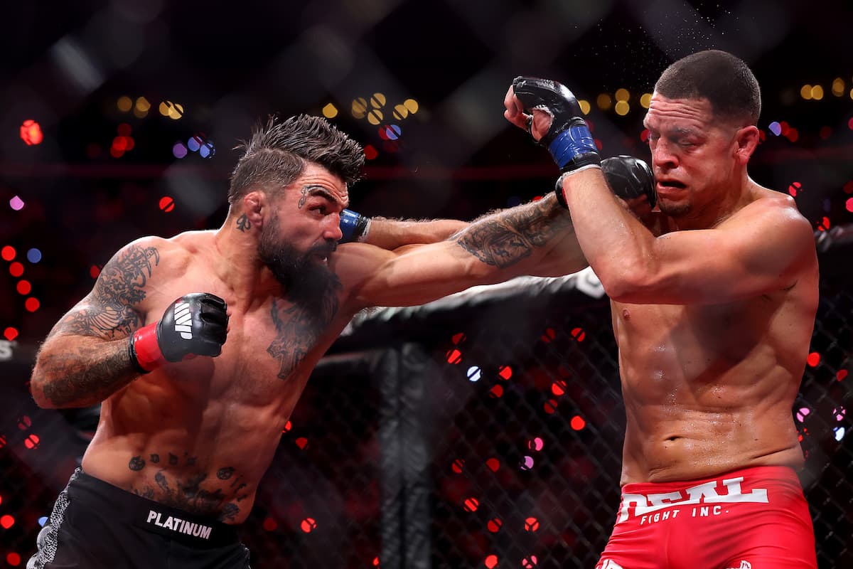 Mike Perry throws a jab during his bout against Nate Diaz