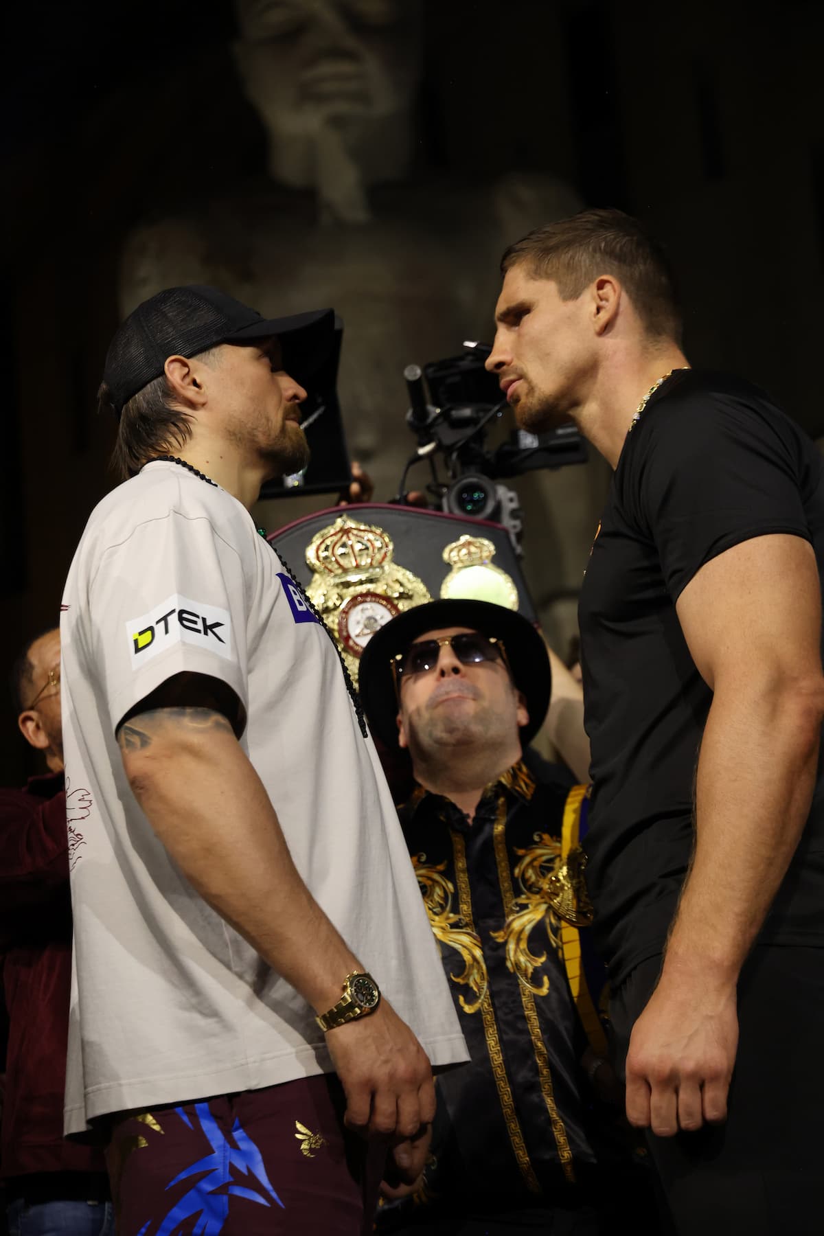 Oleksandr Usyk and Rico Verhoeven face off during weigh-in