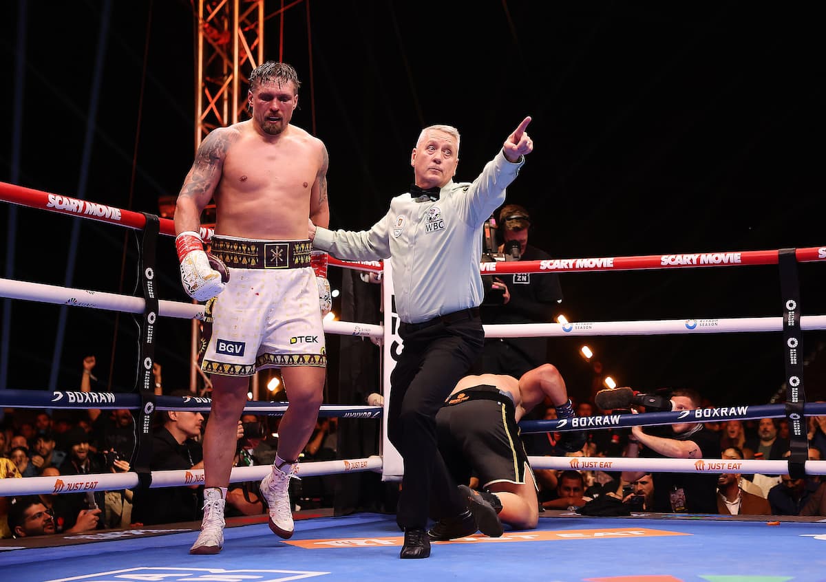 Referee points Oleksandr Usyk to neutral corner as Rico Verhoeven is down