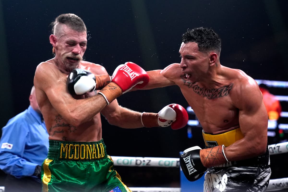 Rahim Mundine lands a punch during his bout against Lance McDonald