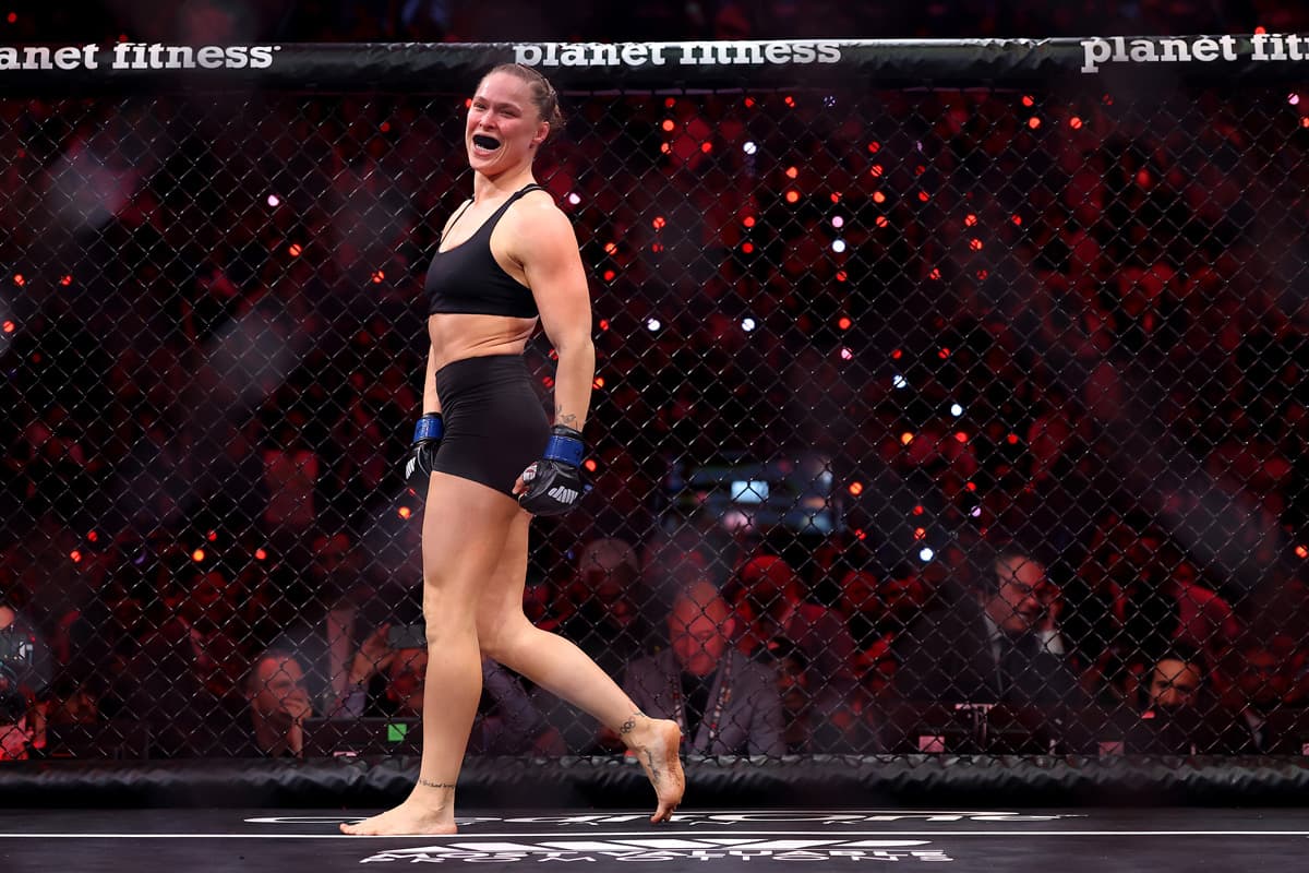 Ronda Rousey in MMA cage during bout