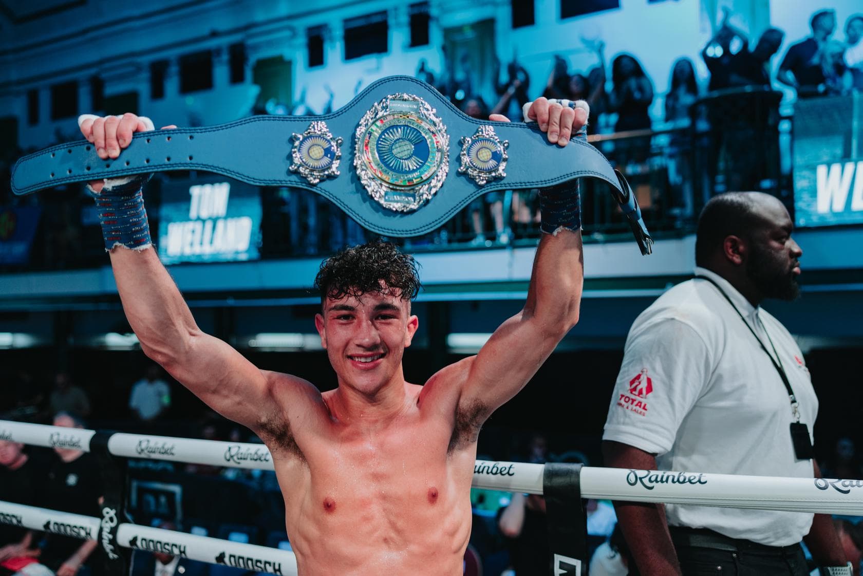 Tom Welland poses with his belt after his victory over Saleh Kassim