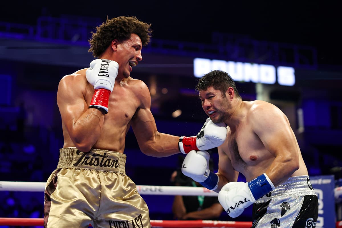 Tristan Kalkreuth lands an uppercut during boxing bout against Marco Antonio Canedo