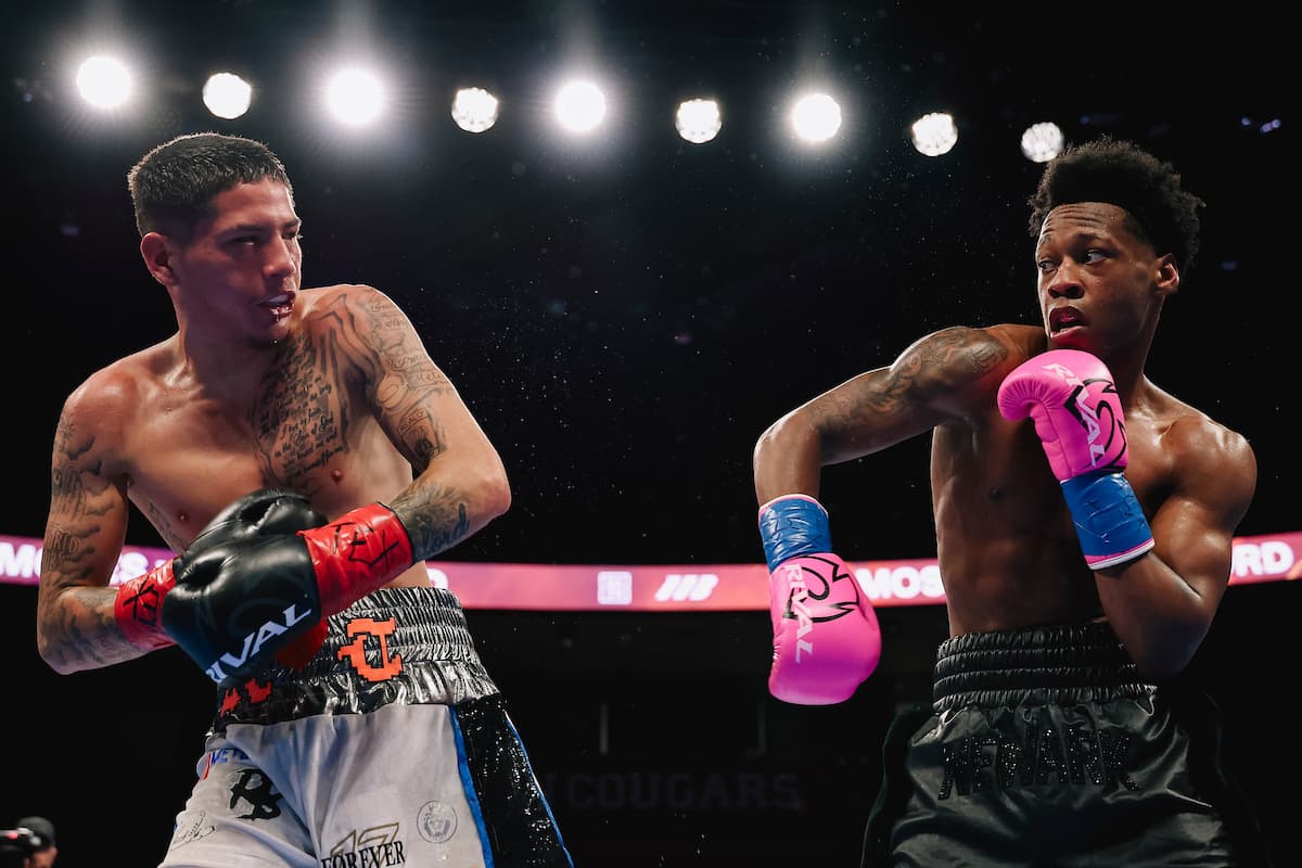 Zaquin Moses and Travis Crawford during their bout