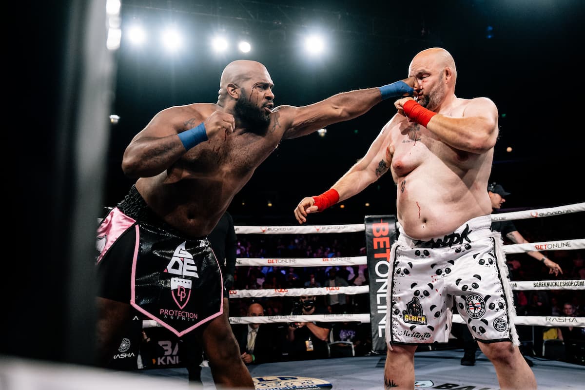 Arnold Adams lands a jab during his heavyweight bout against Steve Banks