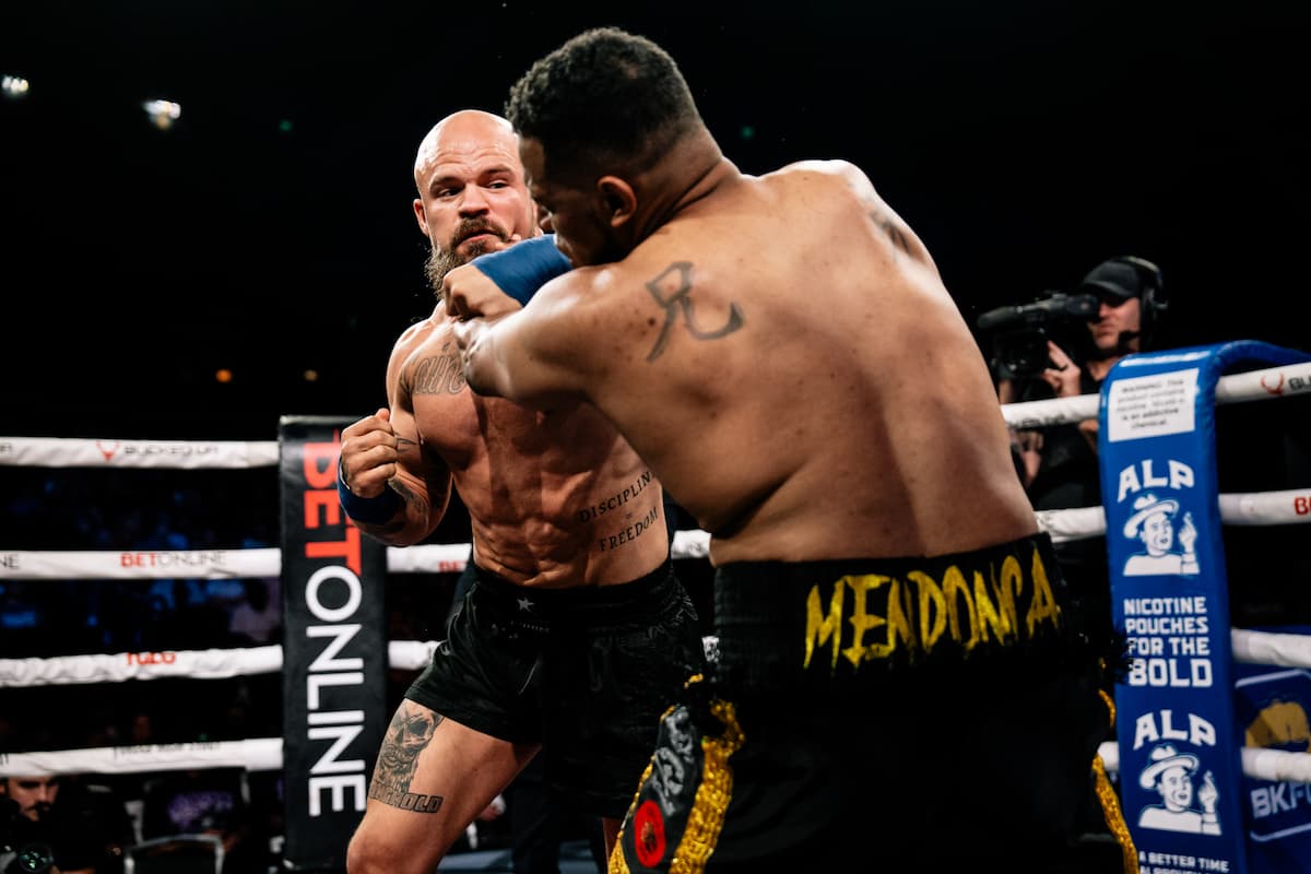Brandon Conley throws a punch during his light heavyweight bout against Aubrey Mendonca