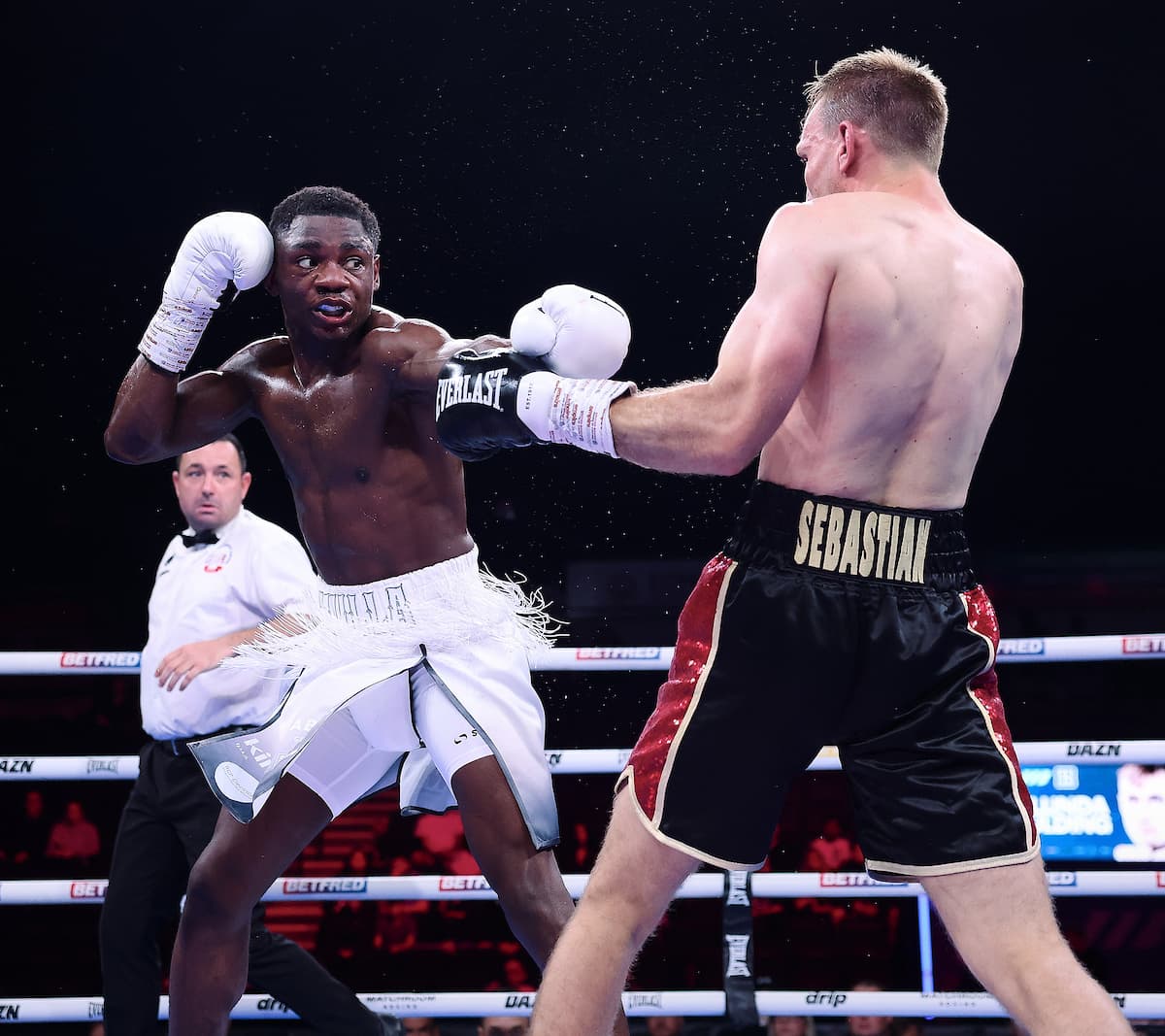 Chris Mulunda throws a jab during his bout against Connor Goulding