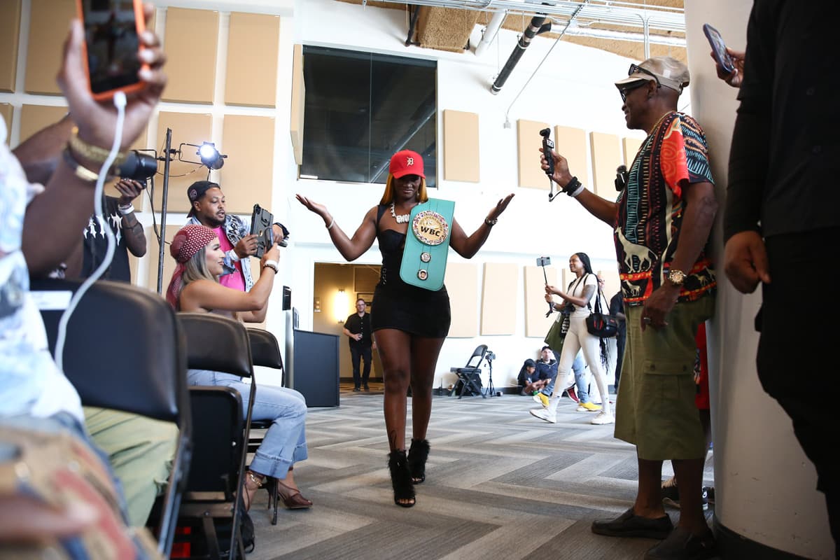 Claressa Shields entering a press conference in Atlanta
