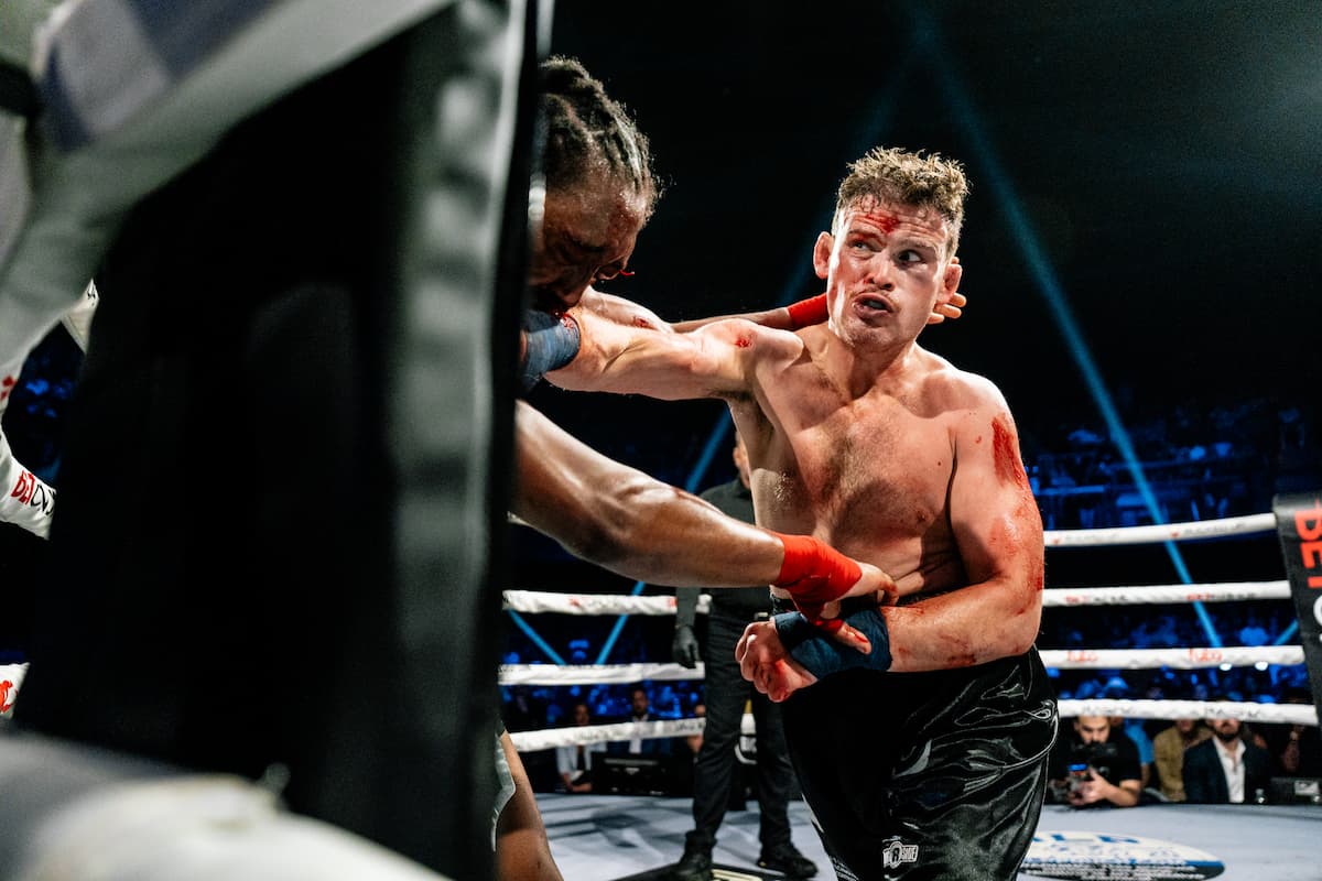 Cole Ferrell lands punches during his bout against Anthony Foye