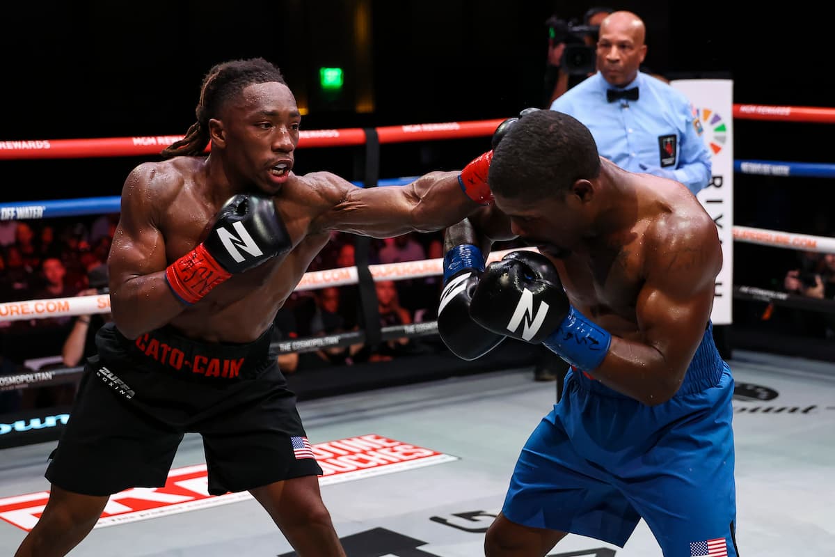 Damoni Cato-Cain lands a jab during his bout against Vernon Brown