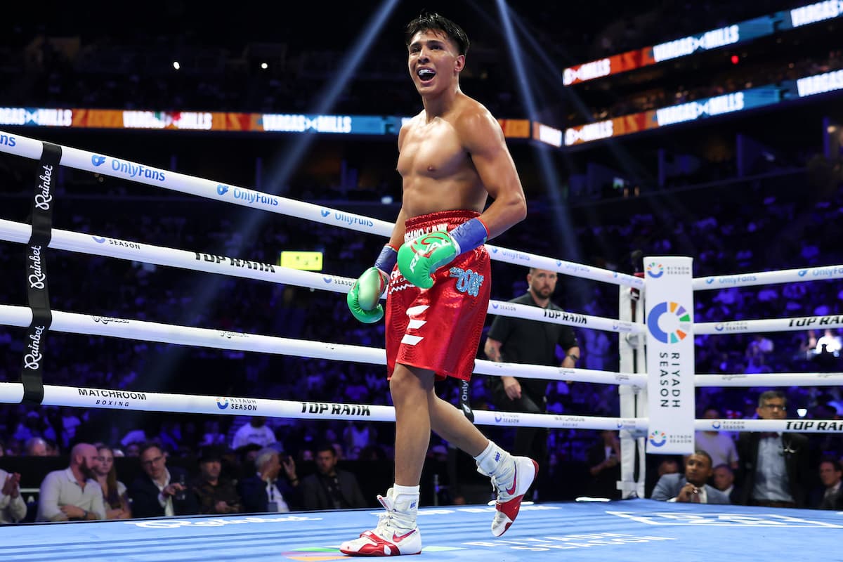 Emiliano Vargas celebrates his victory over Bryce Mills during their bout