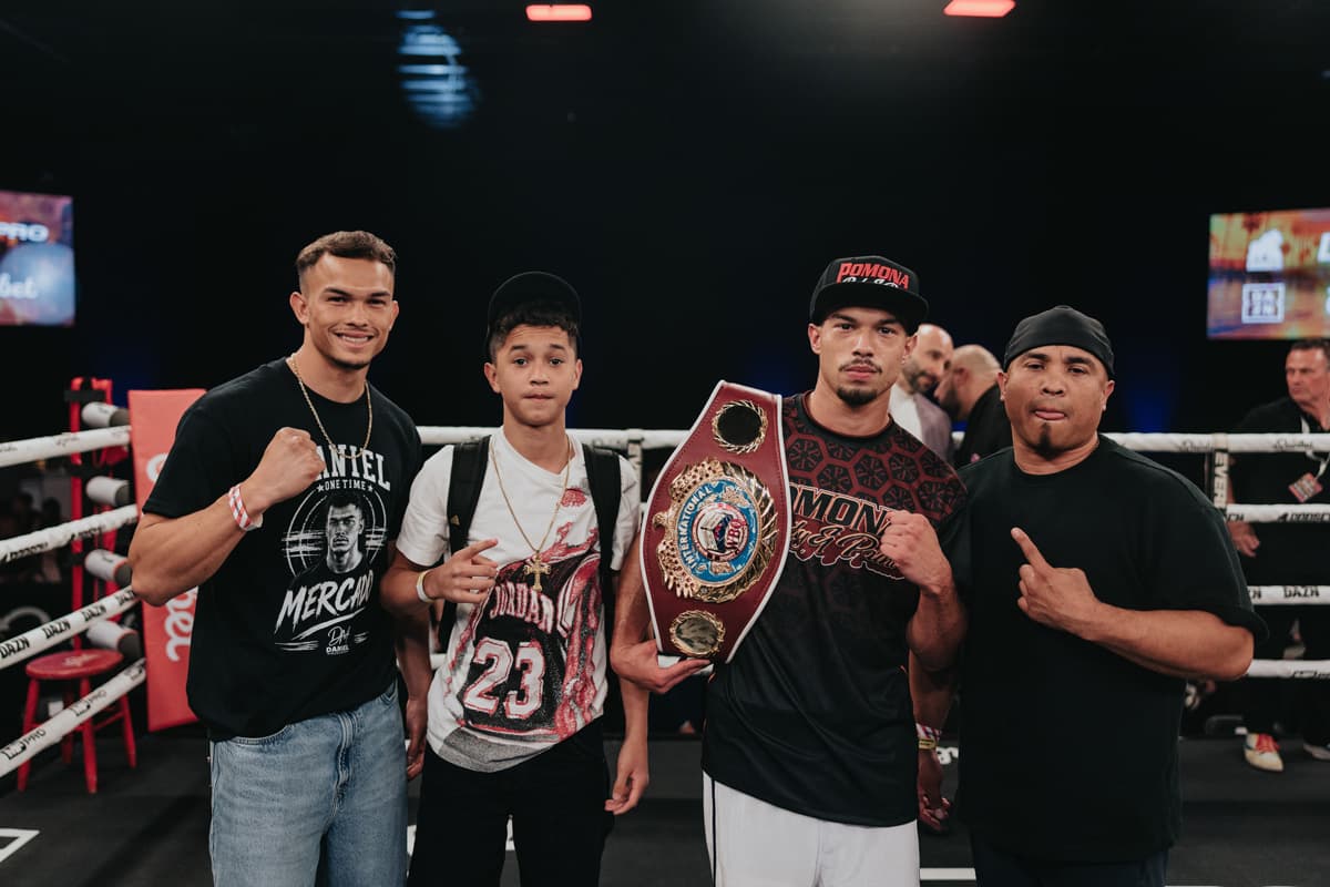 Ernesto "Tito" Mercado with his team after victory over Juan Carlos Burgos