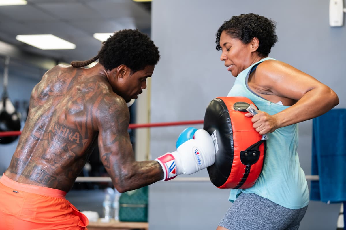 Errol Spence Jr. doing pad work during a media workout