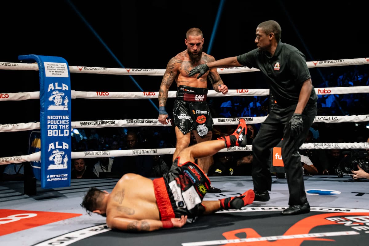 Gorjan Slaveski knocks down Jonny Tello during their bout