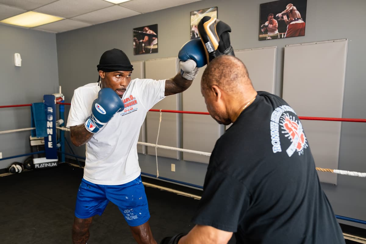 Jermall Charlo doing mitt work during a media workout