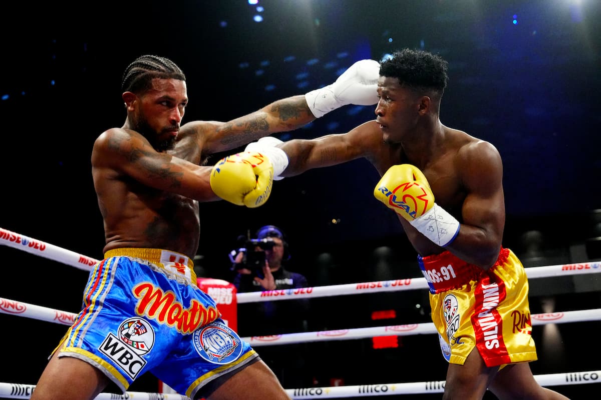 Jhon Orobio throws a punch during his bout against Jonathan Montrel