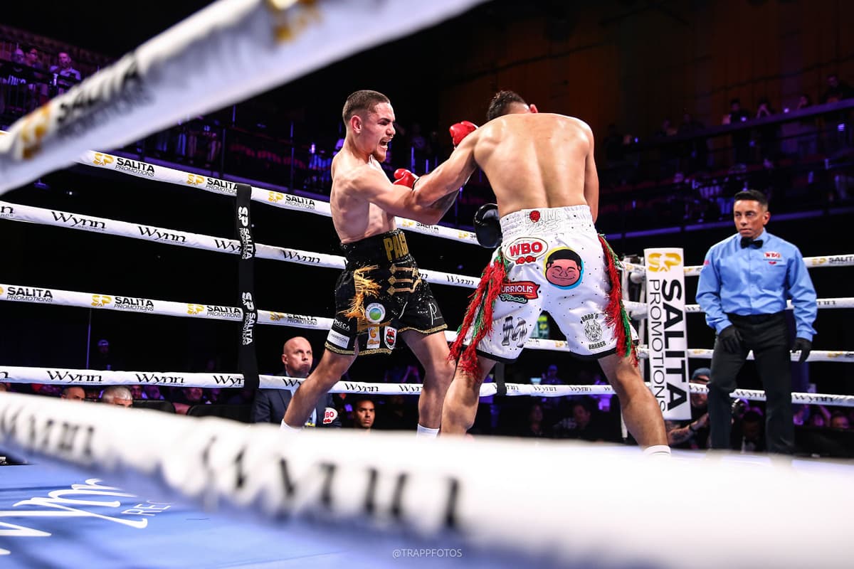 Joshua Pagan lands an uppercut during his bout against Rodolfo Bustamante Salazar