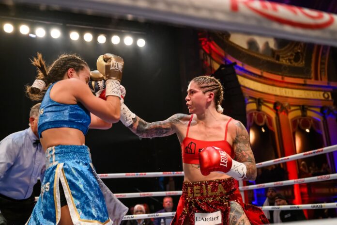 Leila Beaudoin lands a punch during her bout against Paulina Angel