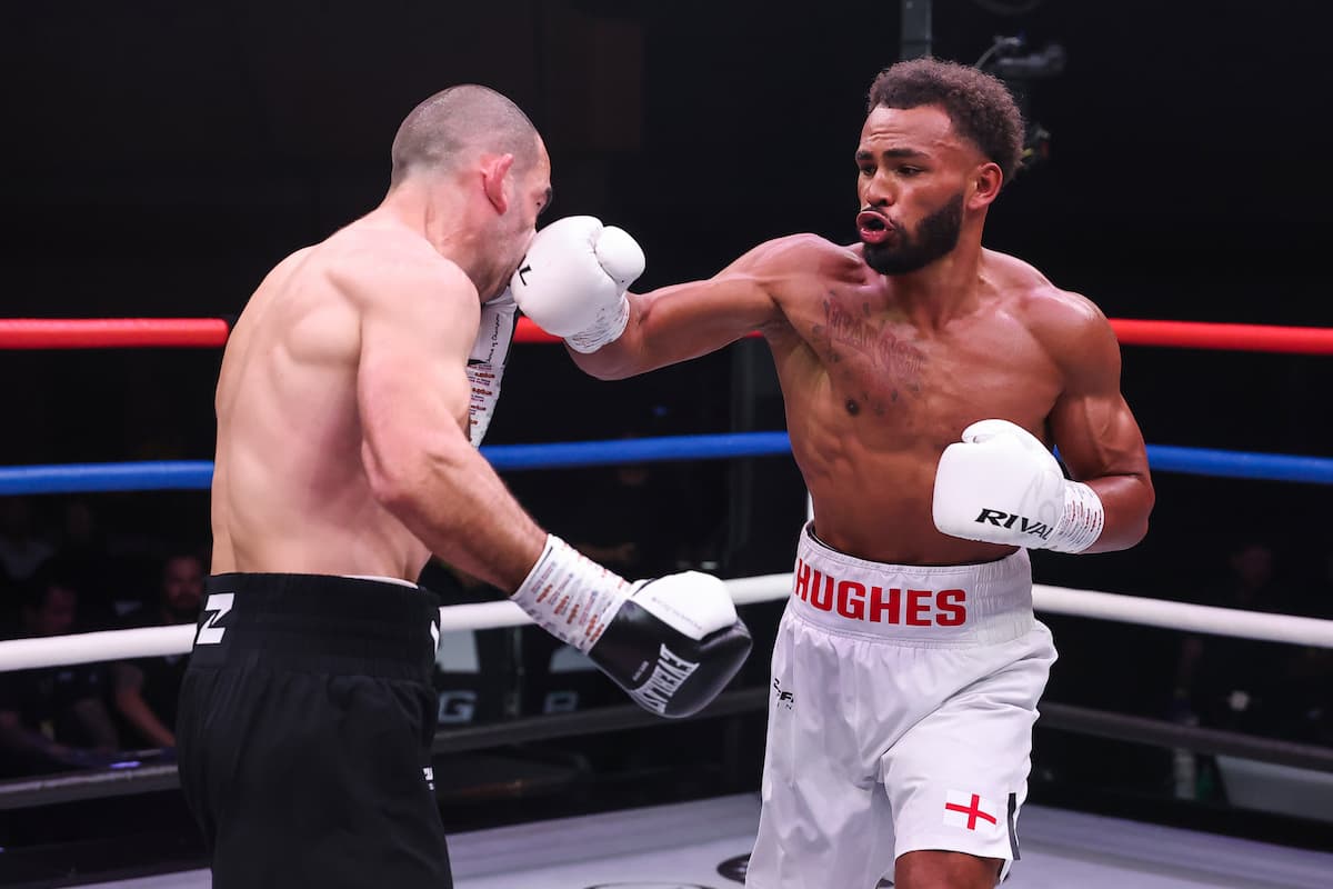Leon Hughes lands a punch during his bout against Mario Vergiev