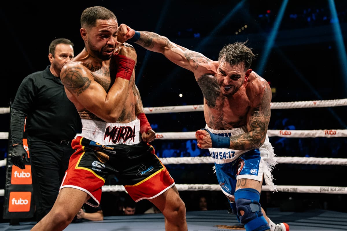 Leonardo Acanda lands a punch during his bout against James Rodriguez