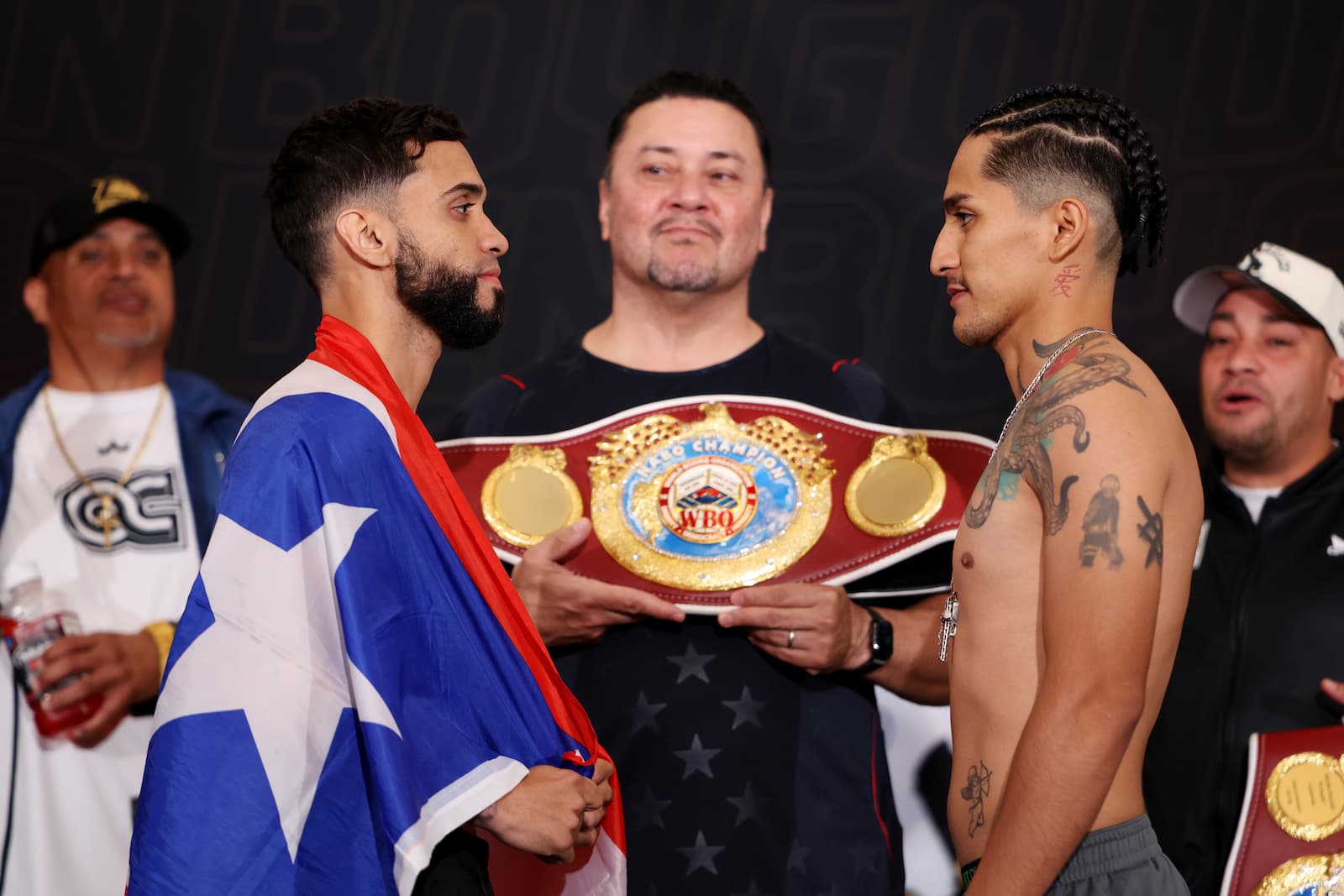 Oscar Collazo and Neider Valdez face off during the weigh-in ahead of their boxing bout