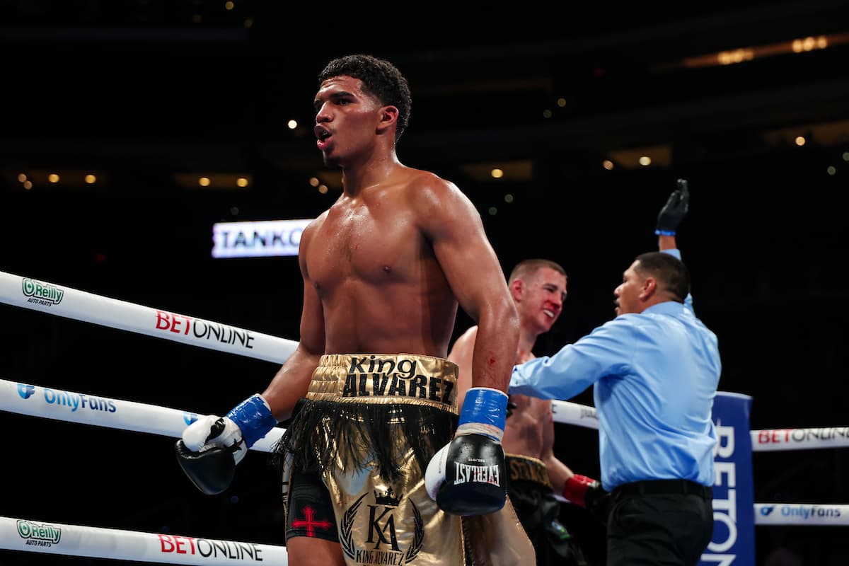 Ronny Alvarez celebrates after the referee stops the fight against Filip Stankovic