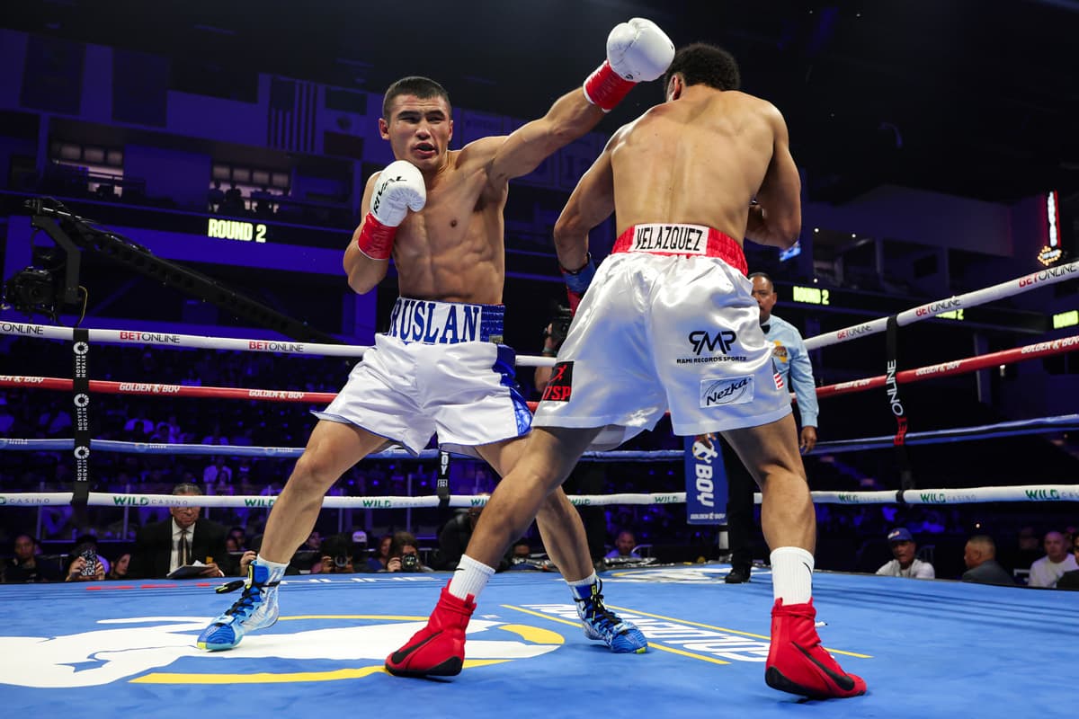 Ruslan Abdullaev throws a jab during his bout against Orestes Velazquez