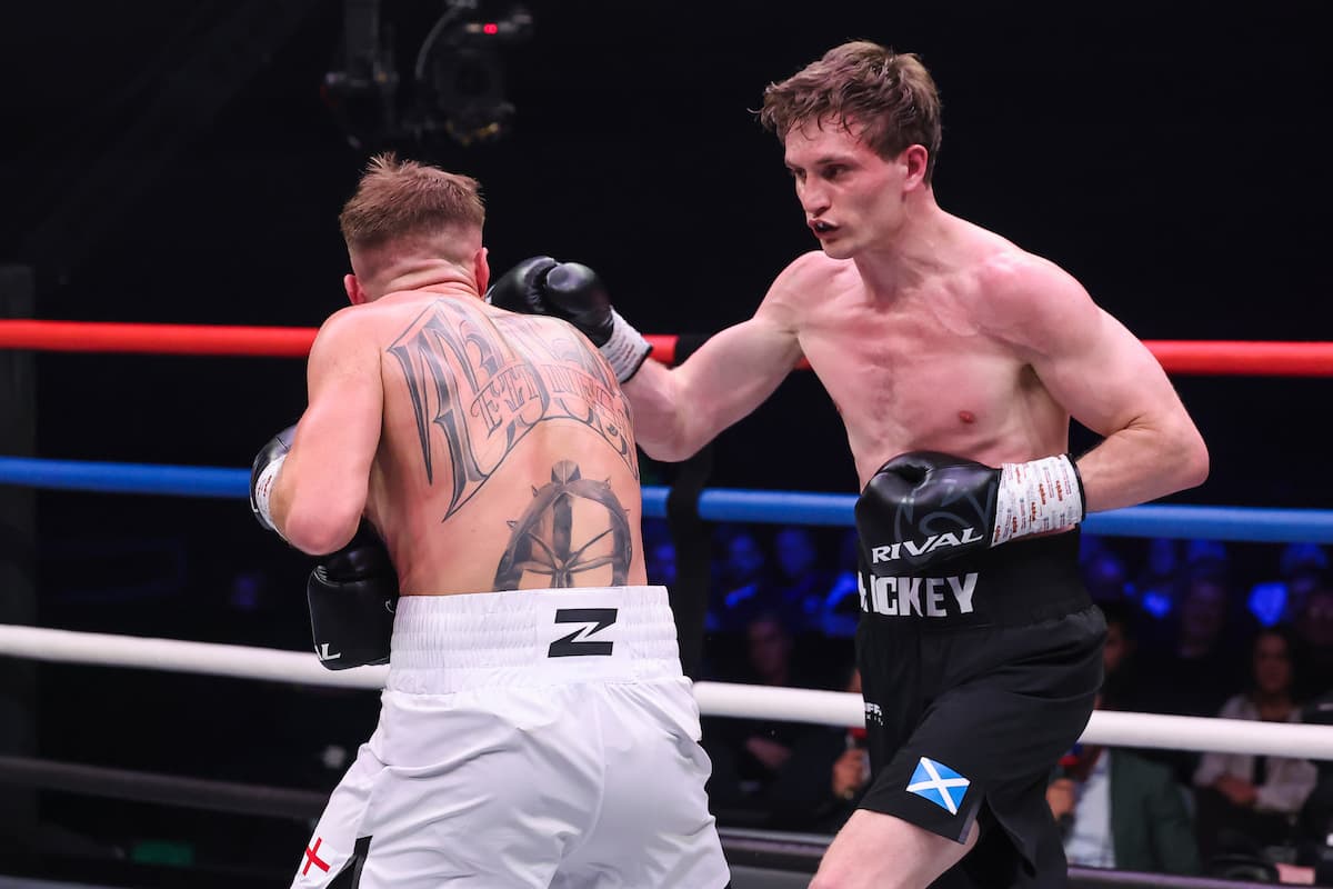 Sam Hickey attacks Todd Tompkins during their bout