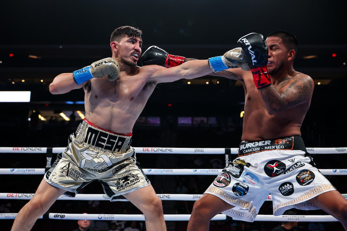 Trini Ochoa lands a jab during his bout against Cristian Perez Hernandez