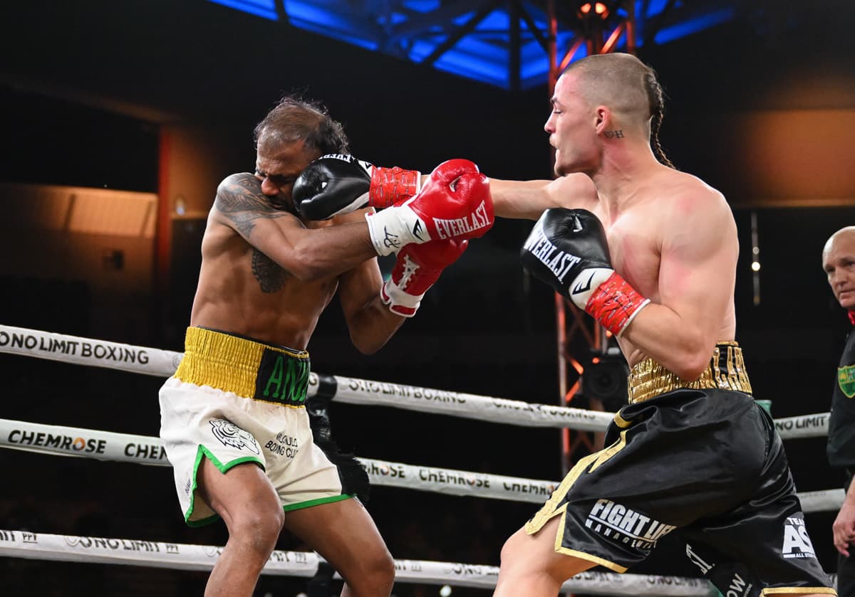 Vegas Larfield lands a punch during his bout against Shamal Ram Anuj