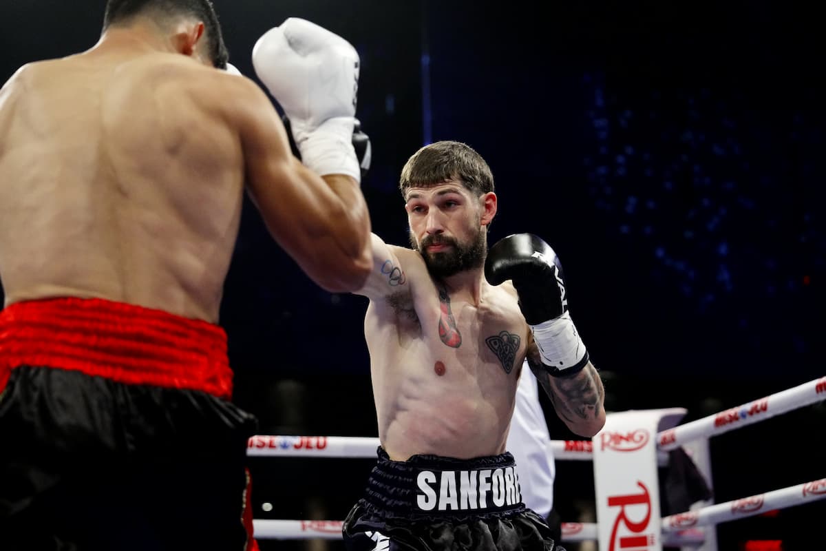 Wyatt Sanford throws a jab during his bout against Juan Pablo Ilharregui