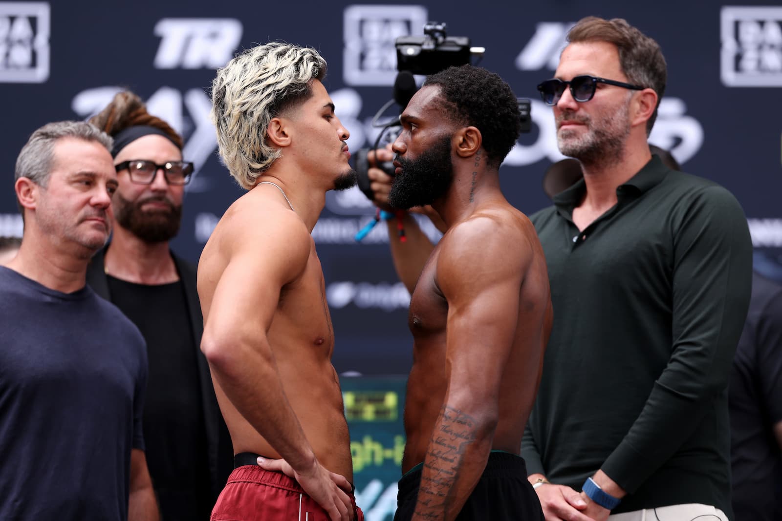 Xander Zayas and Jaron Boots Ennis face off at the weigh-in ahead of their bout