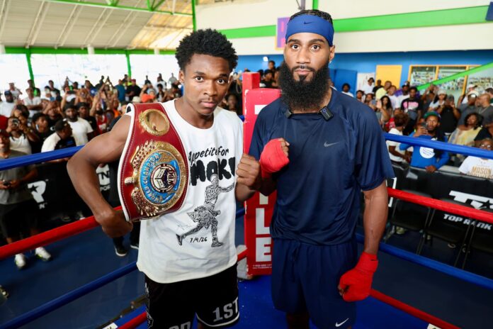 Abdullah Mason and Albert Bell during an open workout