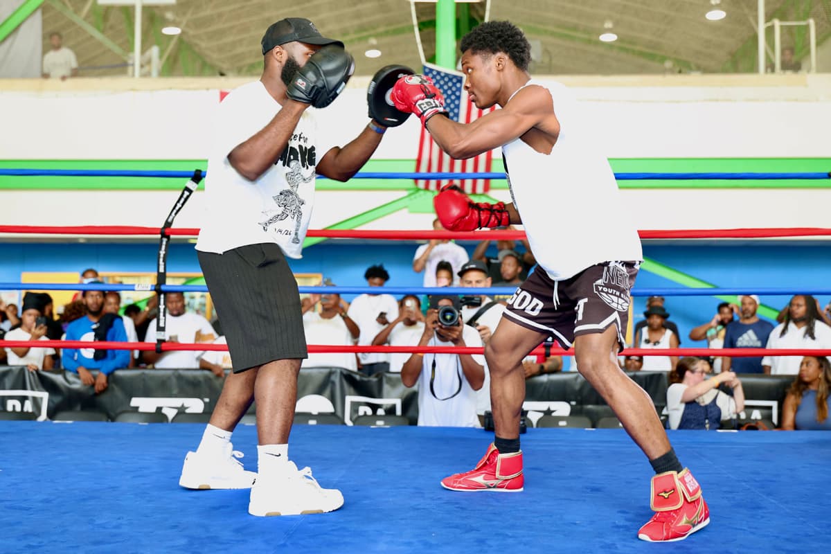 Abdullah Mason during mitt work at an open workout