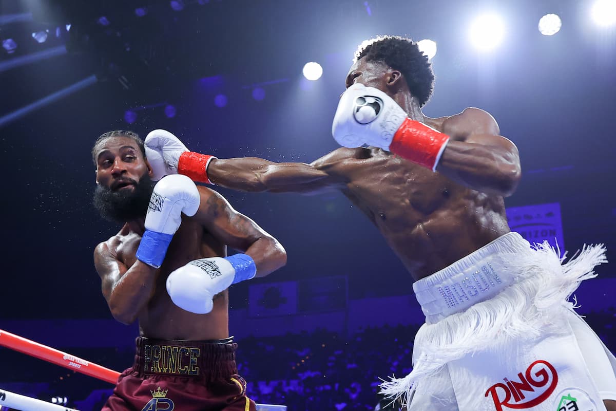 Abdullah Mason lands a jab during his bout against Albert Bell