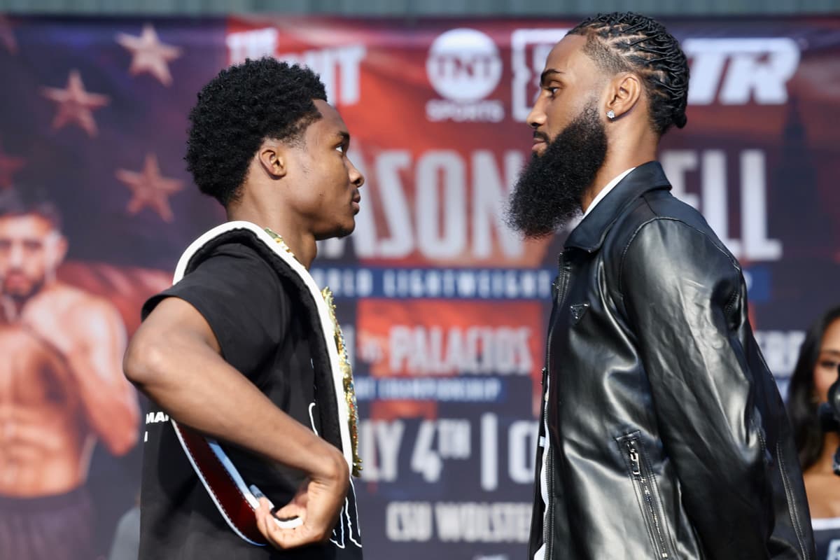 Abdullah Mason and Albert Bell face off at a press conference in Cleveland
