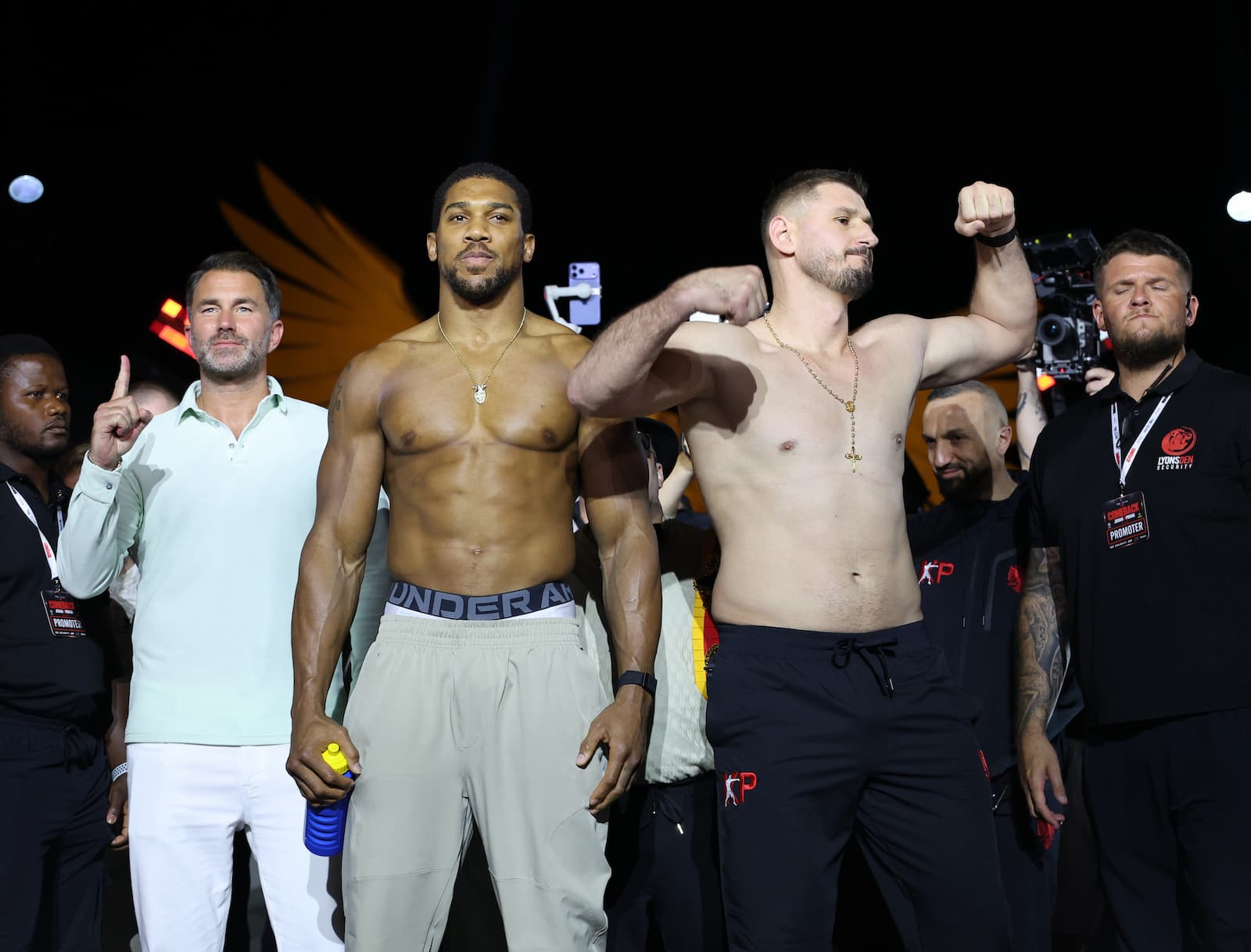 Anthony Joshua and Kristian Prenga during the weigh-in ahead of their boxing bout