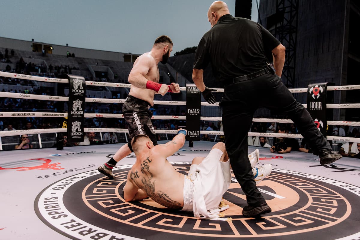 Arbi Chakaev knocks down Dominik Herold during their bout
