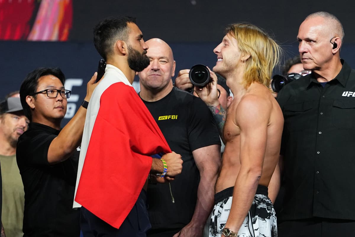 Benoit Saint Denis and Paddy Pimblett face off during the UFC 329 ceremonial weigh-in