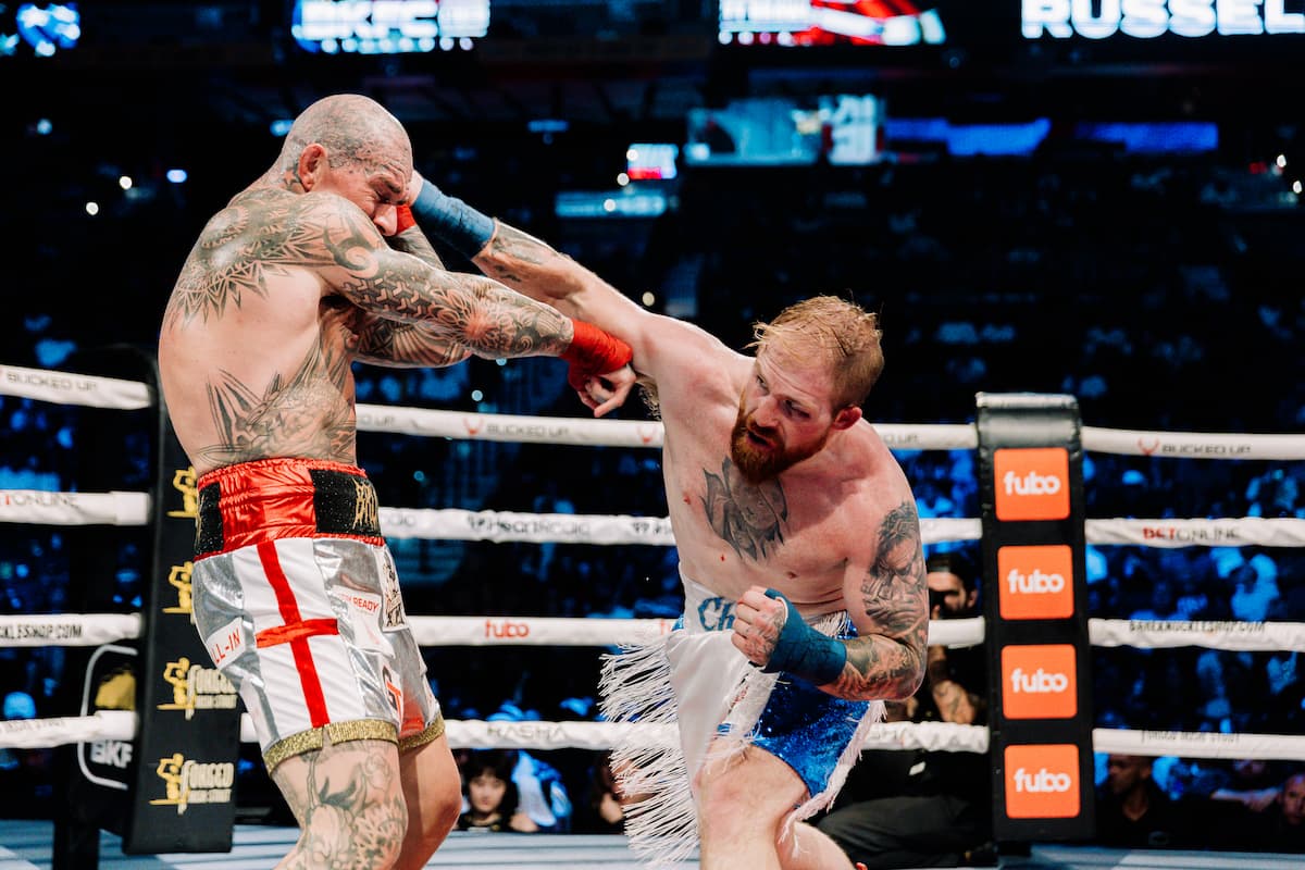 Cody Russell lands a punch during the bout against Jake Bostwick