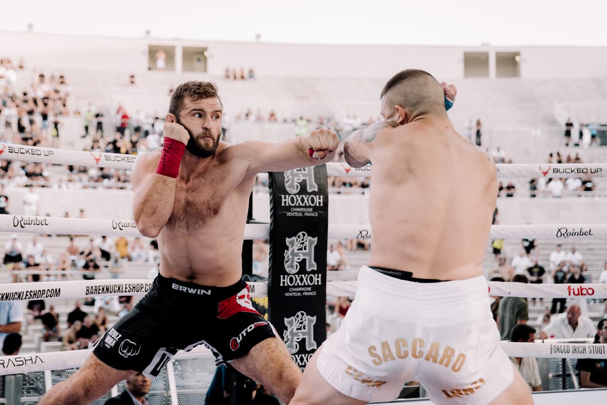Cristian Brinzan throws a jab during his bout against Marco Saccaro