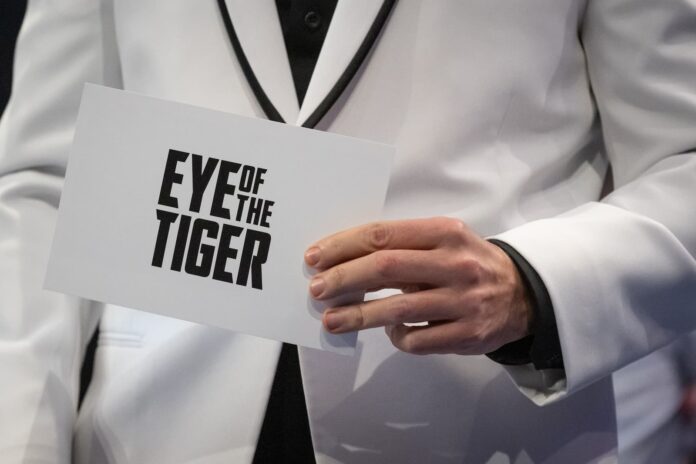 Eye of the Tiger card held during a boxing event