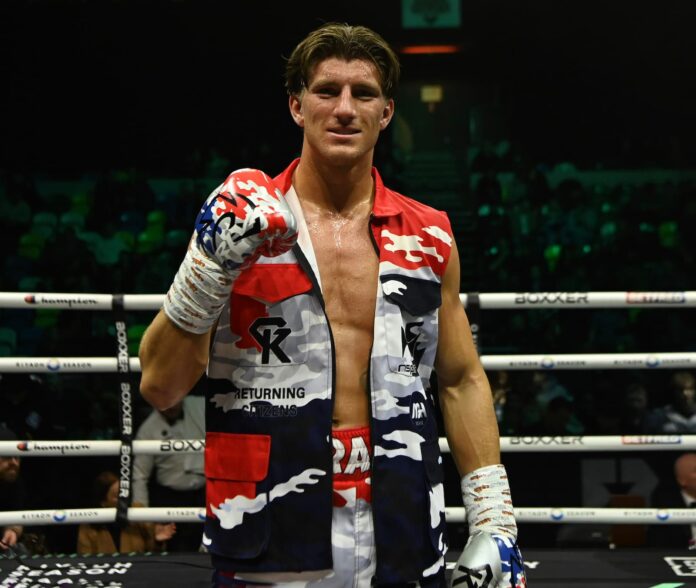 Gradus Kraus posing in the ring after his victory over Boris Crighton