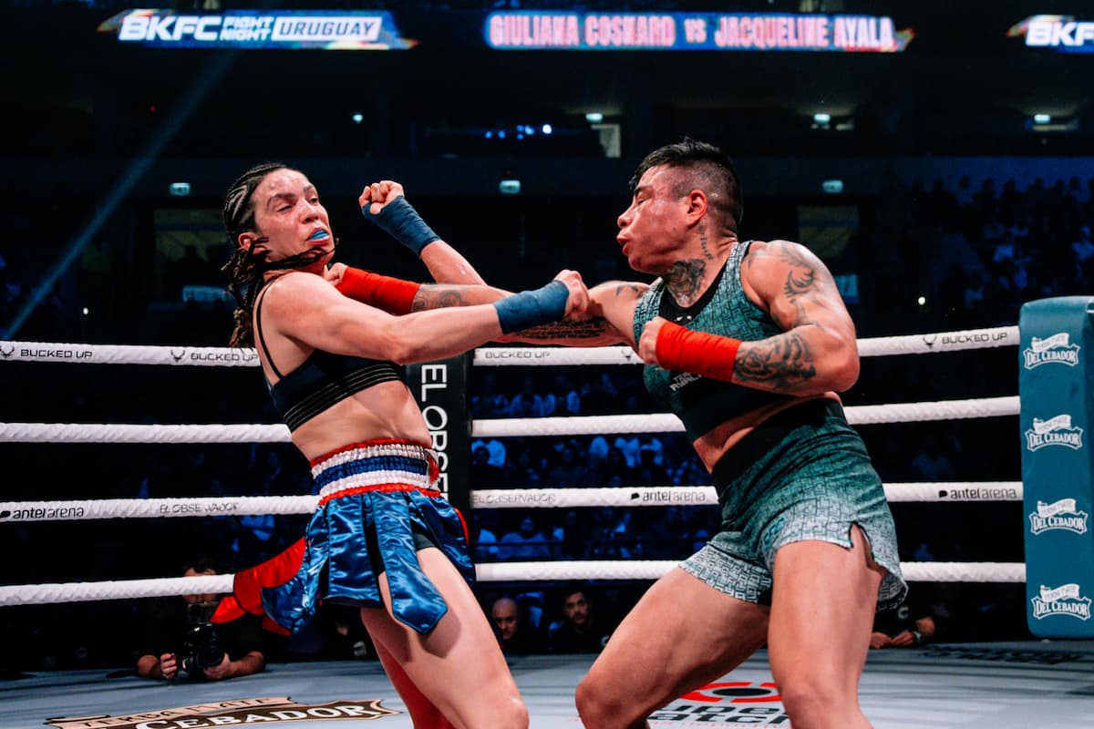 Jacqueline Ayala lands a punch during her bout against Giuliana Cosnard