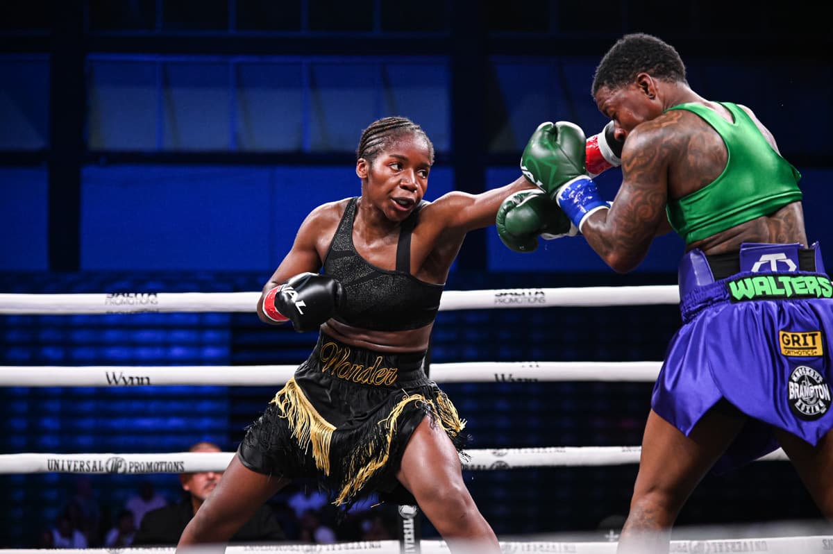 Johanna Wonyou throws a jab during her bout against Tania Walters